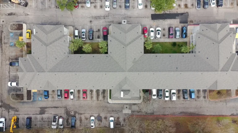Aerial view of a completed multi-family roof project by AVB Construction