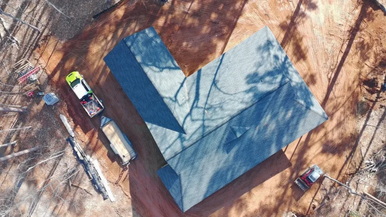 Aerial view of the completed roof on a new home built by AVB Construction