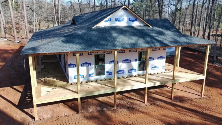 AVB Construction new construction home with covered wraparound porch framed and sheathed