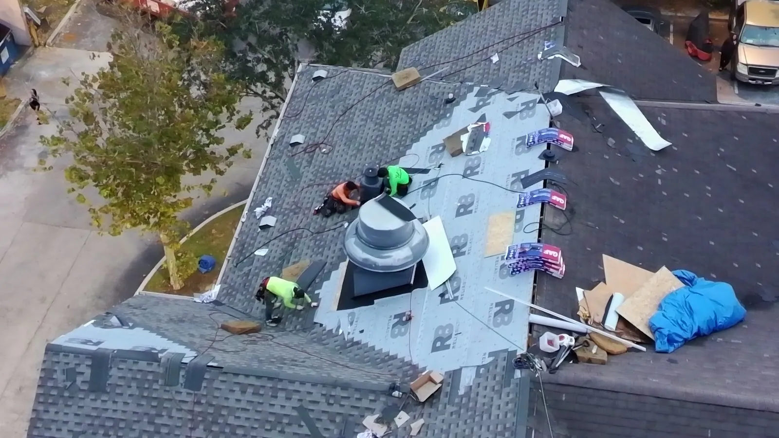 Roof repair with new underlayment installed around a vent by AVB Construction
